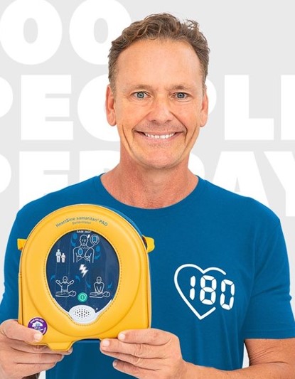 Guy Leech holding a defibrilator